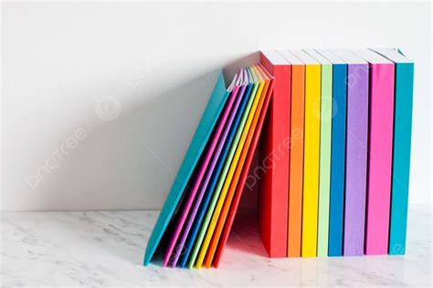 Colorful Books Are Outlined In The Colors Of The Rainbow Stacked Of The ...