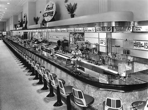 great overall lunch counter with background menu signs - Five and Dime ...