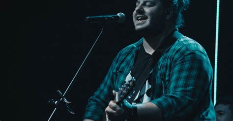 Man Playing Guitar While Singing · Free Stock Photo