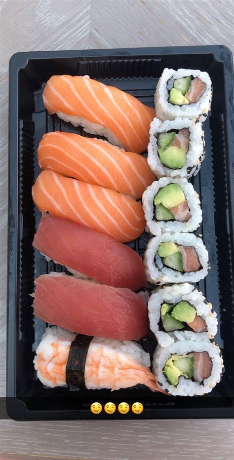 Delicious Sushi Platter with a Variety of Rolls