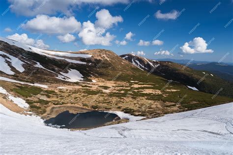 Premium Photo | Spring landscape with a mountain lake