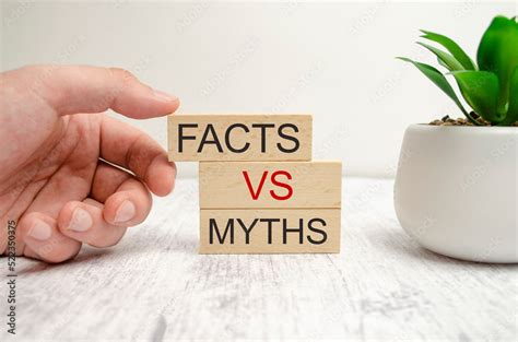 Fact vs myth symbol. Concept words Fact vs myth on wooden blocks Stock ...