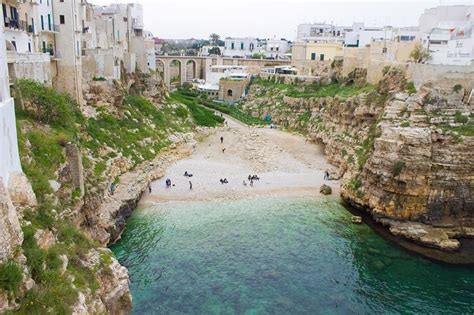 A guide to Polignano a Mare – Italian beach town atop a cliff ...