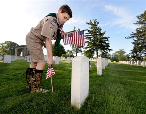 Scouts pay tribute to veterans at Camp Butler National Cemetery