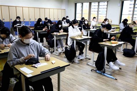 Hush over South Korea as students sit high-stakes university entrance ...