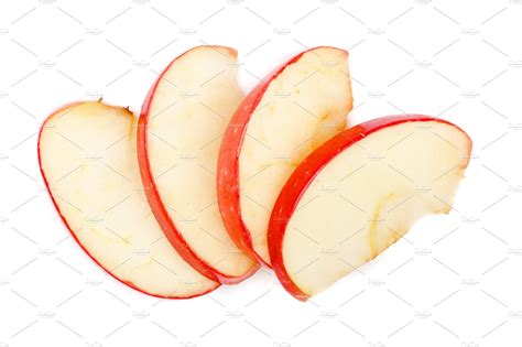 Apple slices isolated on white background closeup top view stock photo ...