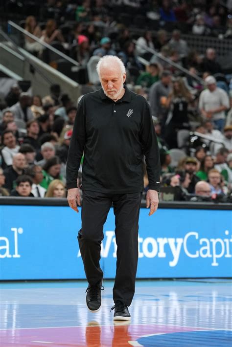 San Antonio Spurs head coach Gregg Popovich looks down during a second ...