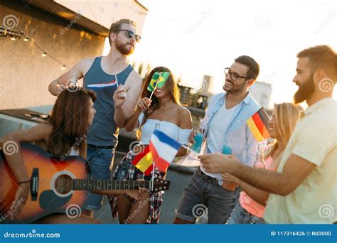 Group of Happy Friends Having Party on Rooftop Stock Photo - Image of ...