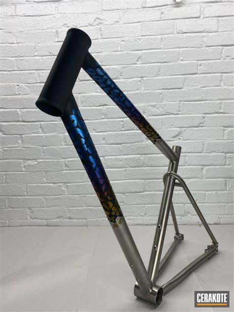 Rainbow Anodized Bike Frame finished in Graphite Black | Cerakote