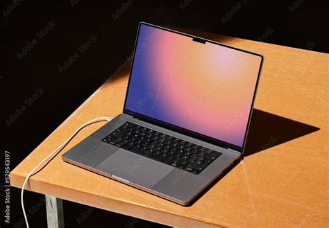 Laptop Mockup on Brown Table Stock Template | Adobe Stock