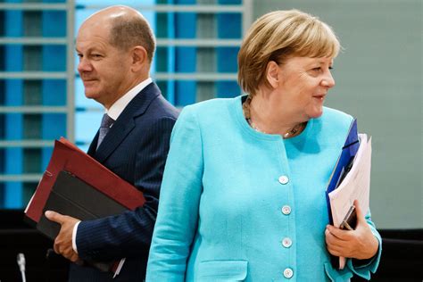 Olaf Scholz replaces outgoing German chancellor Angela Merkel as a new ...