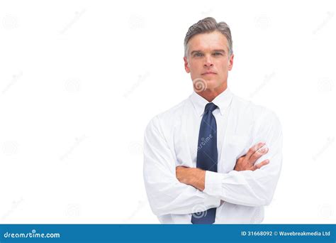 Stern Businessman with Crossed Arms Stock Photo - Image of background ...