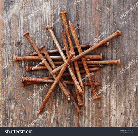 Old Rusty Nails On Wooden Background Stock Photo 61854118 : Shutterstock