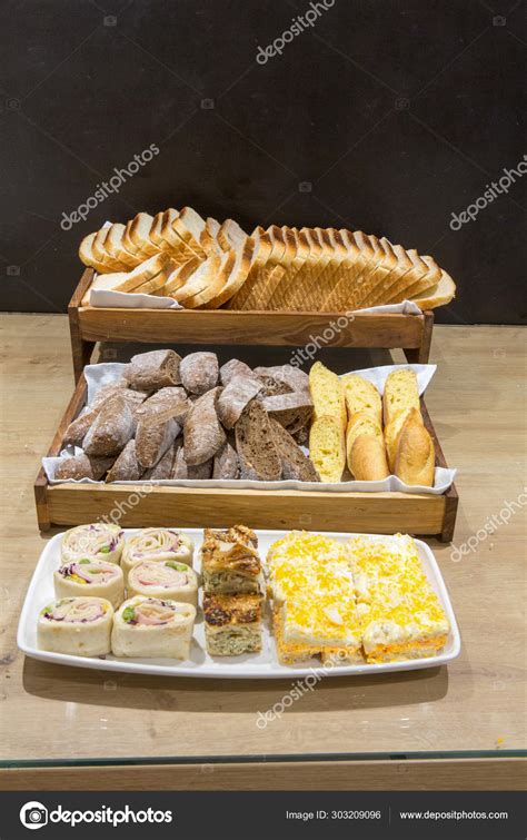 Various types of bread on hotel buffet table Stock Photo by ©rilueda ...