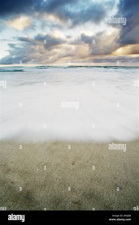 Early morning beach scene Stock Photo - Alamy