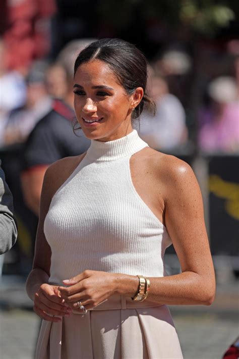 Meghan Markle wows in red suit at One Young World Summit