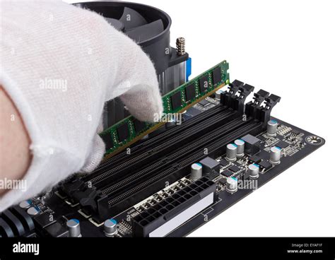 Installing memory module in DIMM slot on modern PC computer motherboard ...