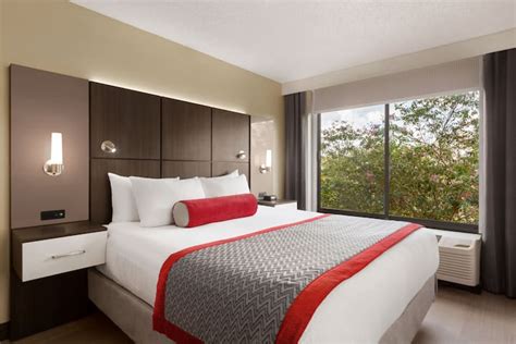 Ramada by Wyndham Suites Orlando Airport | Orlando, FL Hotels