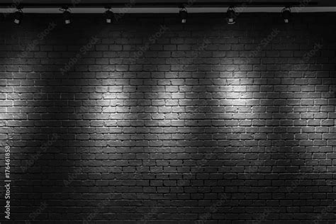 black brick wall background with light bulb Stock Photo | Adobe Stock