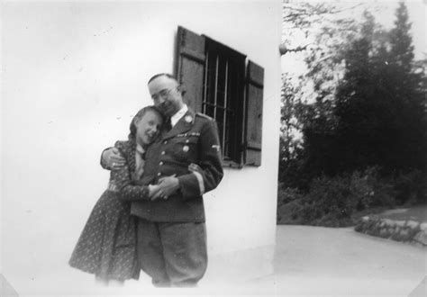 Reichsfuehrer-SS Heinrich Himmler embraces his daughter Gudrun ...