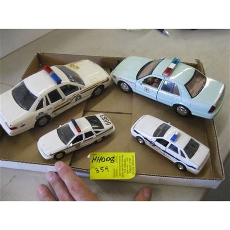 4 DIECAST POLICE CARS