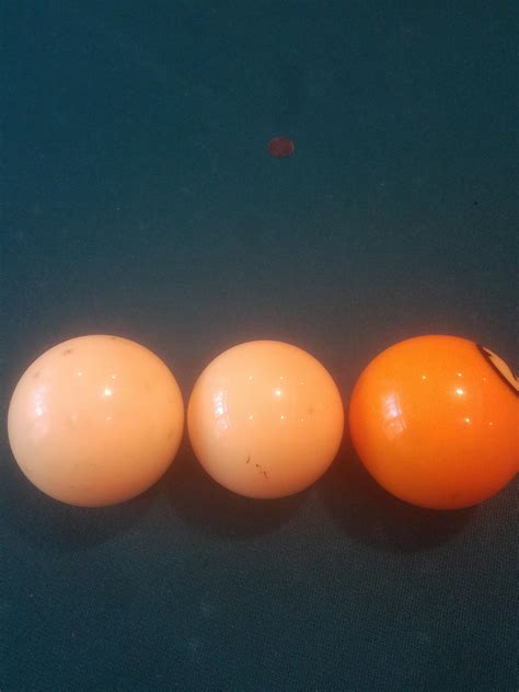 Found a smaller cue ball in our box of cue balls. : r/billiards