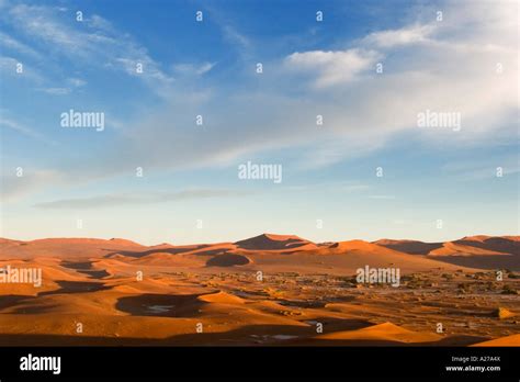 Sunrise in the dunes of namib desert, Namib Desert, Namibia Stock Photo ...