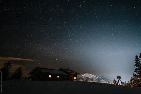 "Wooden Alpine Cabin In Snowcovered Mountain Landscape At Night Under ...