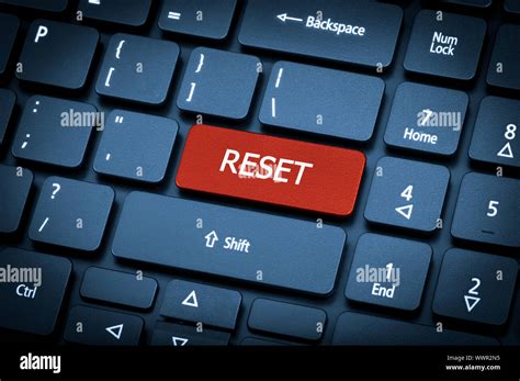 Laptop keyboard. The focus on the Reset key Stock Photo - Alamy