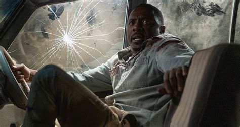 Idris Elba Runs From Killer Lion in First ‘Beast’ Trailer – Watch Now ...