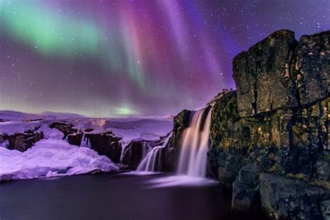 The Aurora Borealis lighting up one of Iceland's iconic waterfalls | I ...