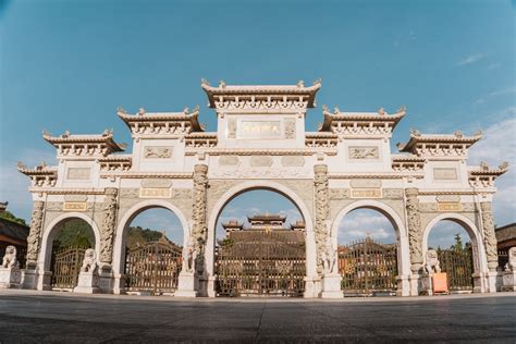 Symmetrical View of Chinese Gate with Arches · Free Stock Photo