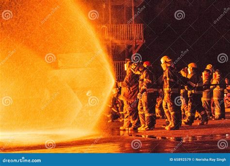 Teams of Firefighters Working on a Fire Editorial Stock Image - Image ...