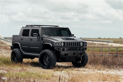 Mean-looking Hummer H2 SUT With a Lift and Fuel Off-road Wheels — CARiD ...