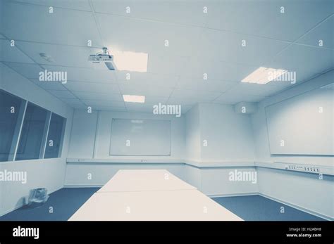 Whiteboard in a conference room in blue color Stock Photo - Alamy