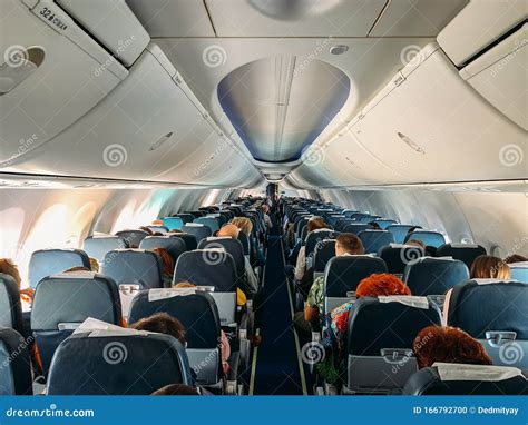 Airplane Interior Inside with Passengers in Flight Stock Photo - Image ...