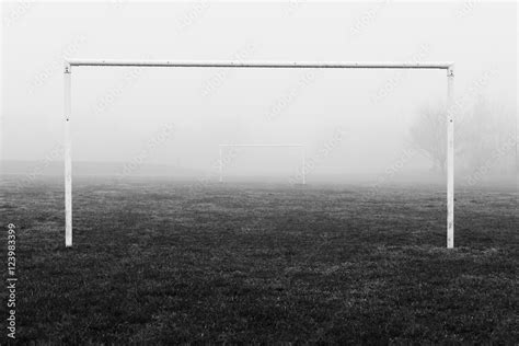 Black and white image of soccer football goal posts in empty field ...