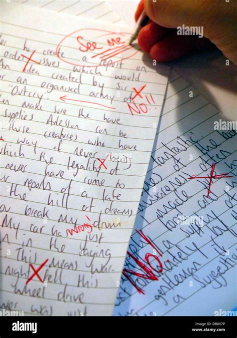 A teacher marking a poor exam paper Stock Photo - Alamy