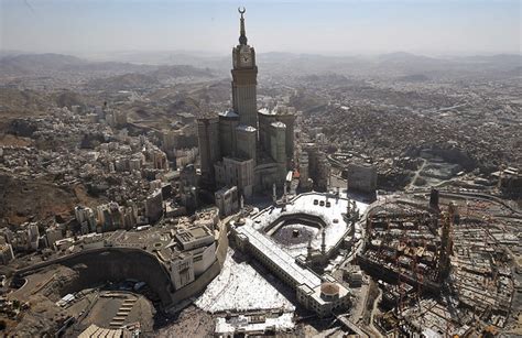 An aerial view shows the Mecca Clock Tower as Muslim pilgrims walking ...