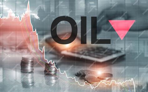 Premium Photo | Price oil down oil barrels and a financial chart on ...