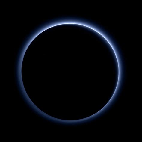 Pluto's atmosphere backlit by the Sun captured by the departing New ...