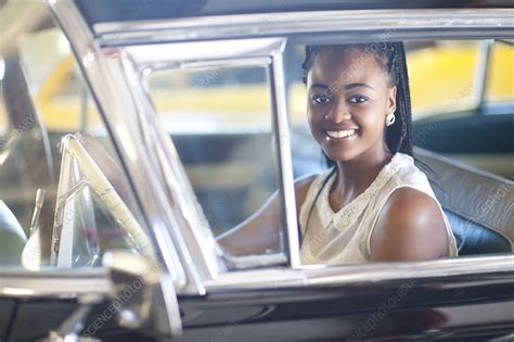 Woman driving vintage car - Stock Image - F009/8599 - Science Photo Library