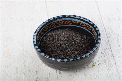 Black sesame seeds 7706271 Stock Photo at Vecteezy