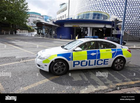 West Midlands police patrol car responding to call out in city centre ...