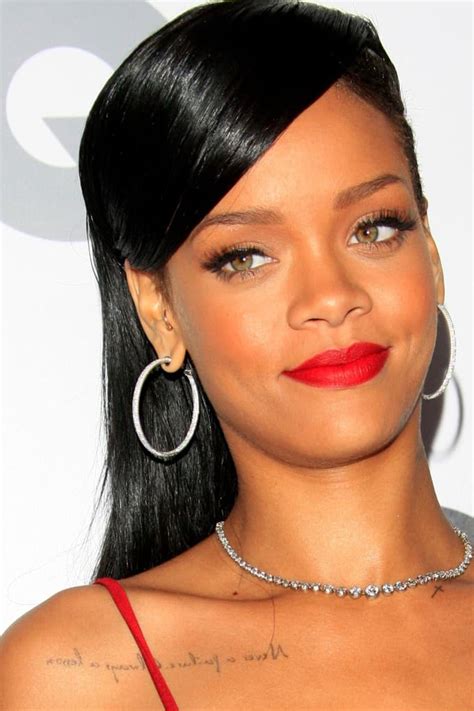 Rihanna's Tattoos and What They Mean - [2021 Celebrity Ink Guide]