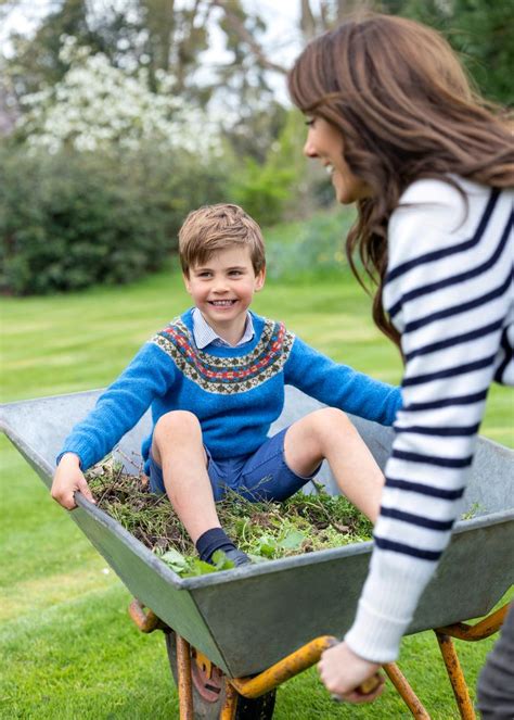 Prince Louis pictured in wheelbarrow in playful birthday photos with ...