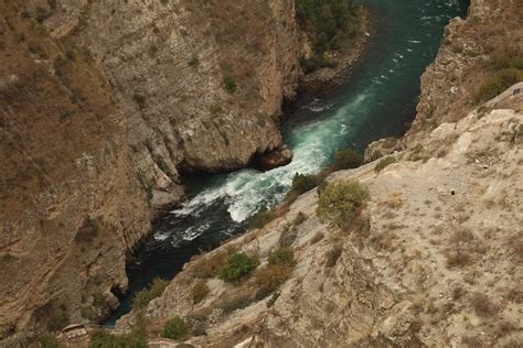 A River Between Rocky Mountains · Free Stock Photo