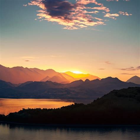 Premium AI Image | Sunrise and Mountain Lake