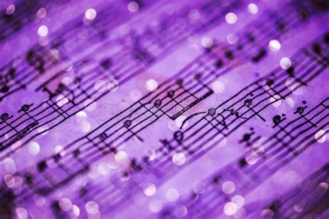 Violet music notes. Music notes sheet in violet tonality and blurred ...