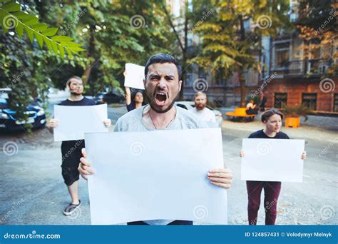 Group of Protesting Young People Outdoors Stock Image - Image of poster ...